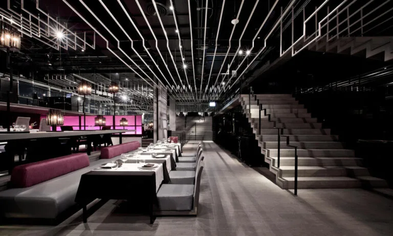 Commercial lighting is ==atmosphere and overhead== designed together.
