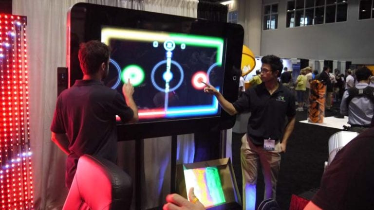Playing-Glow-Hockey-On-A-Giant-iPhone-Giant-iPad