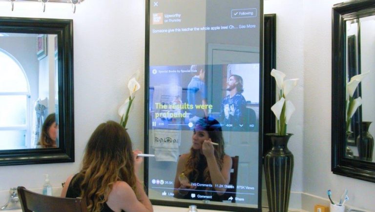 A-Woman-Applies-Makeup-In-Front-Of-Her-Smart-Mirror