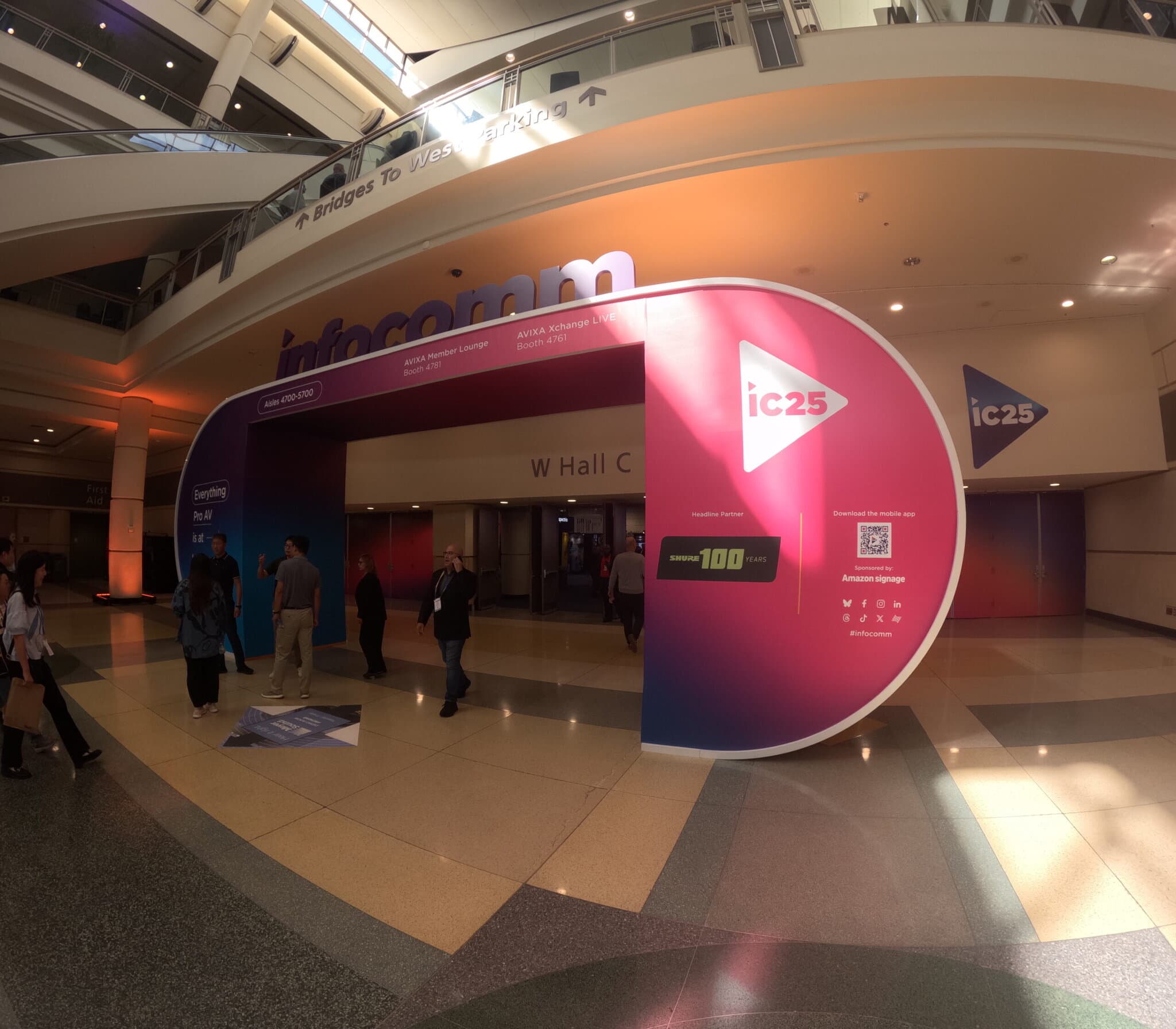 People entering InfoComm event at W Hall C entrance.