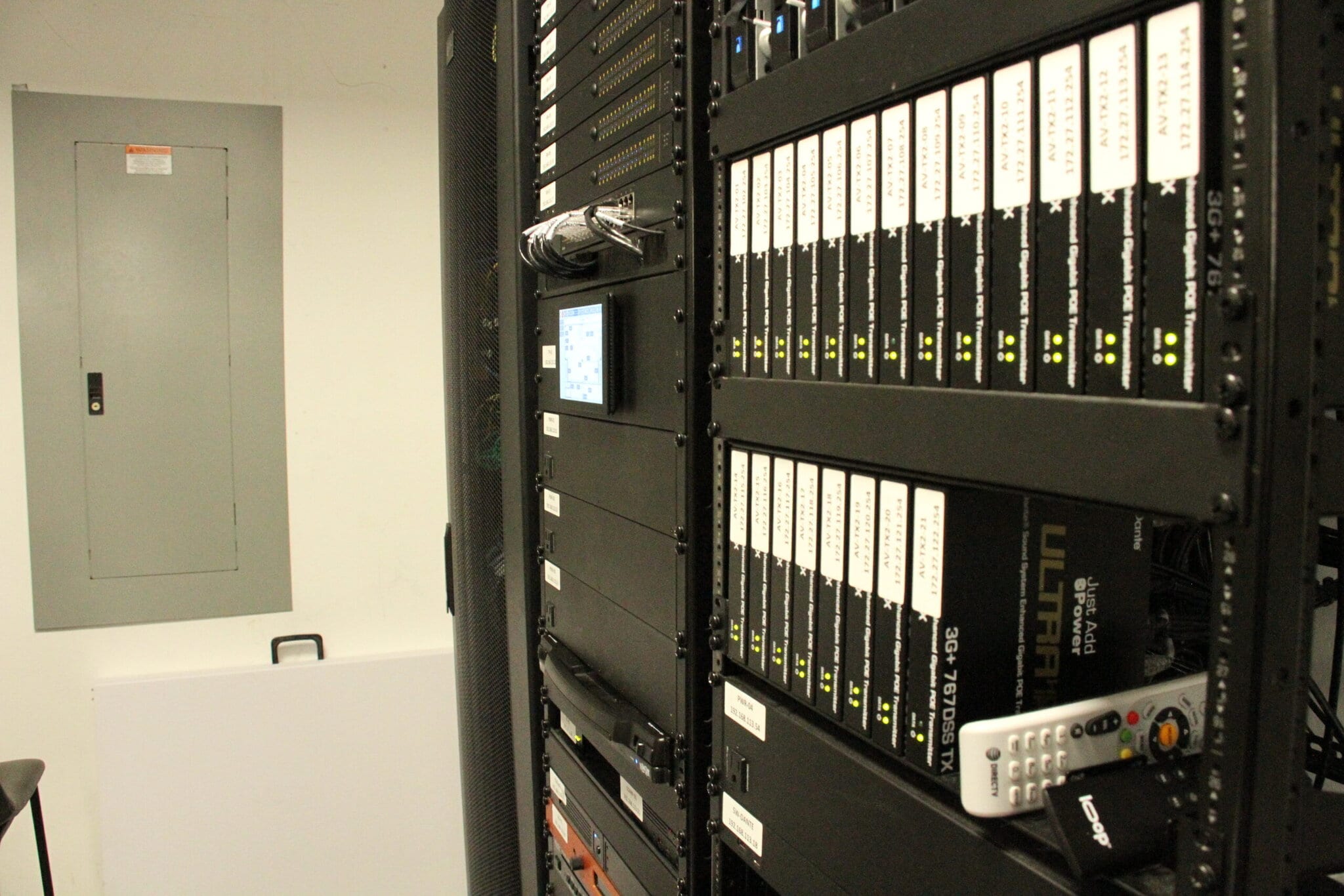 Server rack with cables and equipment.