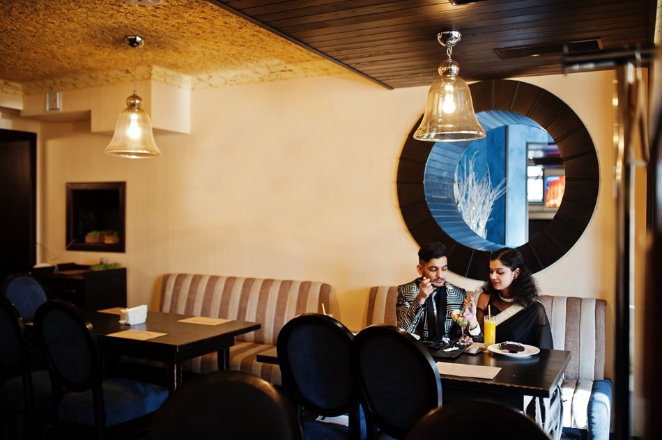 Couple dining in cozy restaurant setting