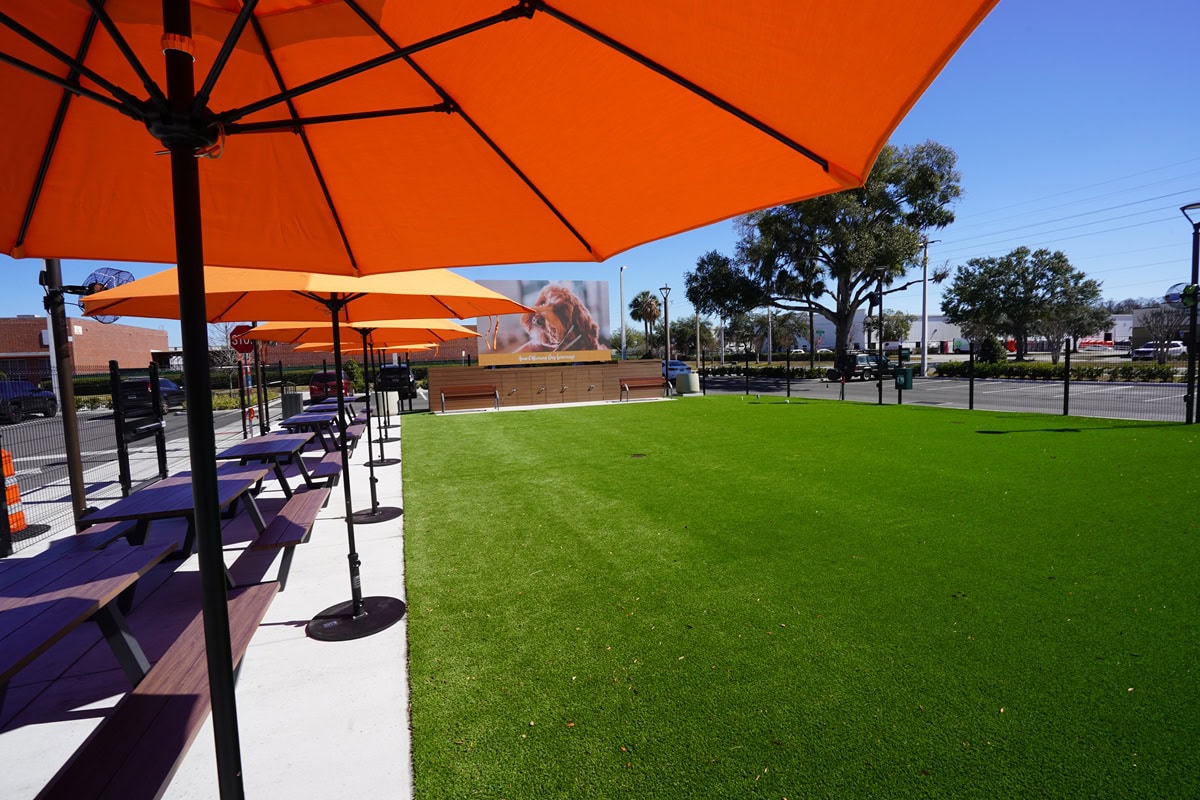 Outdoor seating area with orange umbrellas
